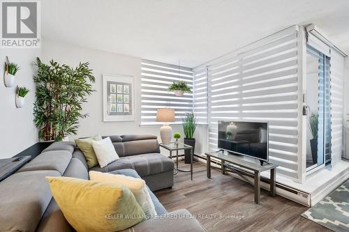 1004 - 2500 Bridletowne Circle, Toronto, ON - Indoor Photo Showing Living Room