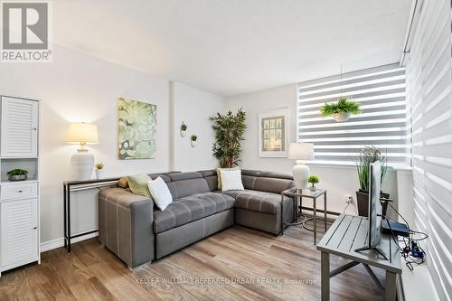 1004 - 2500 Bridletowne Circle, Toronto, ON - Indoor Photo Showing Living Room