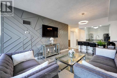 1011 - 410 Mclevin Avenue, Toronto, ON - Indoor Photo Showing Living Room