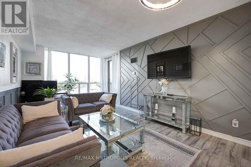 1011 - 410 Mclevin Avenue, Toronto, ON - Indoor Photo Showing Living Room