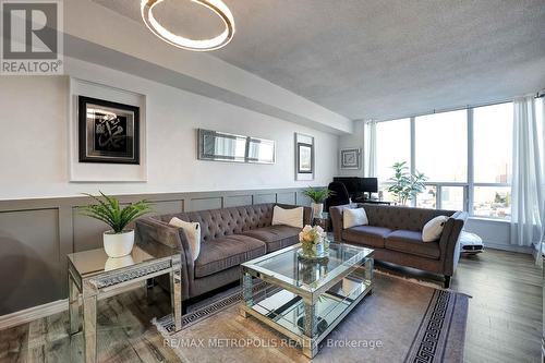 1011 - 410 Mclevin Avenue, Toronto, ON - Indoor Photo Showing Living Room