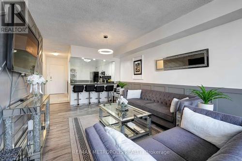 1011 - 410 Mclevin Avenue, Toronto, ON - Indoor Photo Showing Living Room