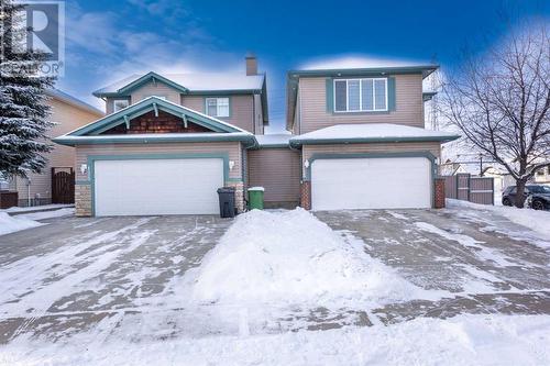 129 Lakeview Inlet, Chestermere, AB - Outdoor With Facade