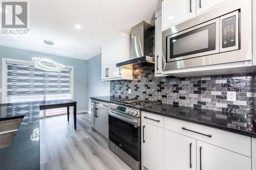 129 Lakeview Inlet, Chestermere, AB - Indoor Photo Showing Kitchen With Upgraded Kitchen