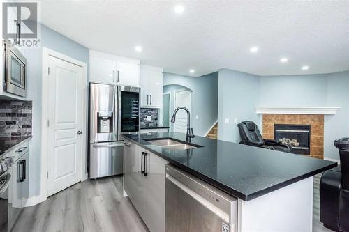 129 Lakeview Inlet, Chestermere, AB - Indoor Photo Showing Kitchen With Upgraded Kitchen