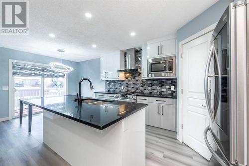 129 Lakeview Inlet, Chestermere, AB - Indoor Photo Showing Kitchen With Upgraded Kitchen