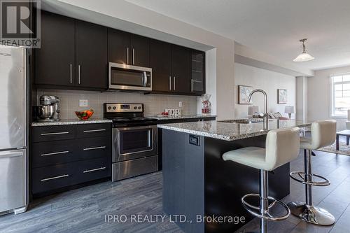 103 - 1890 Rymal Road, Hamilton, ON - Indoor Photo Showing Kitchen With Stainless Steel Kitchen With Upgraded Kitchen