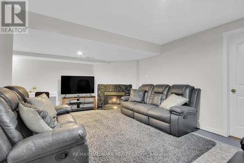 4320 Owl Valley Drive, Ottawa, ON - Indoor Photo Showing Living Room With Fireplace