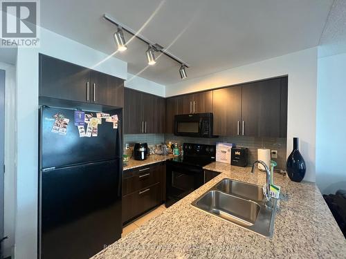 709 - 80 Esther Lorrie Drive, Toronto, ON - Indoor Photo Showing Kitchen With Double Sink