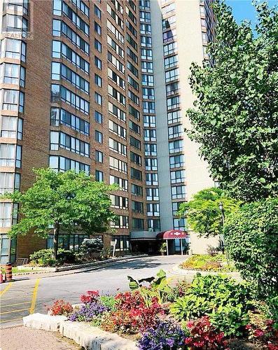 1937 - 25 Bamburgh Circle, Toronto, ON - Outdoor With Facade