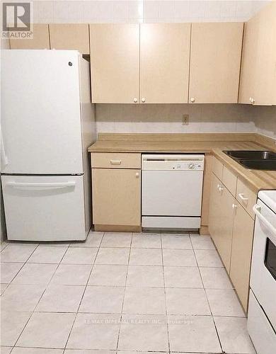 1937 - 25 Bamburgh Circle, Toronto, ON - Indoor Photo Showing Kitchen