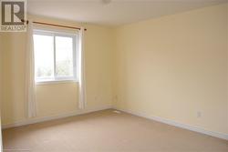 Spare room with carpet flooring - 