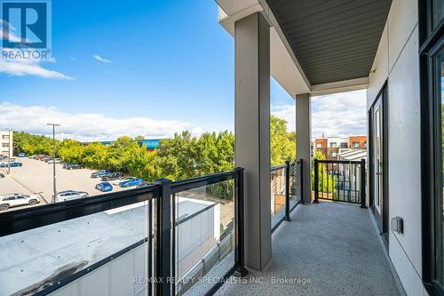 409 - 160 Canon Jackson Drive, Toronto, ON - Outdoor With Balcony With Exterior