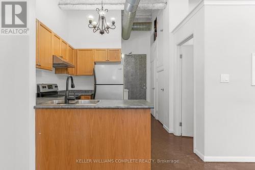 304 - 11 Rebecca Street, Hamilton, ON - Indoor Photo Showing Kitchen With Double Sink