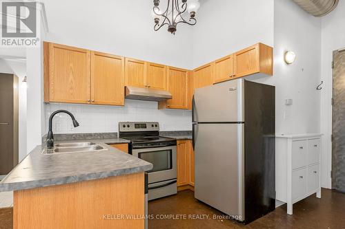 304 - 11 Rebecca Street, Hamilton, ON - Indoor Photo Showing Kitchen With Double Sink