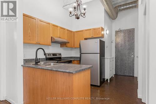 304 - 11 Rebecca Street, Hamilton, ON - Indoor Photo Showing Kitchen With Double Sink