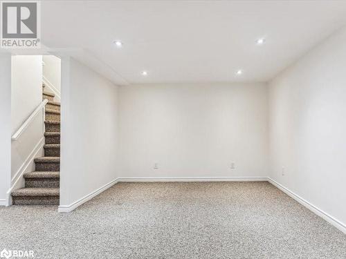 View of carpeted empty room - 242 Lakeport Road Unit# 22, St. Catharines, ON - Indoor Photo Showing Other Room