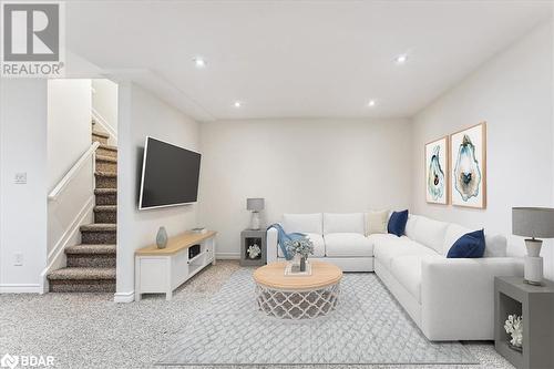 Living room featuring light carpet - 242 Lakeport Road Unit# 22, St. Catharines, ON - Indoor Photo Showing Other Room