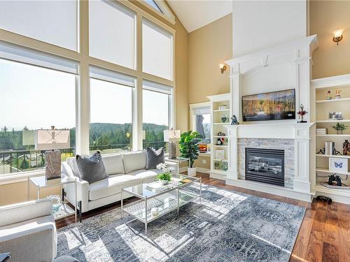 16-614 Granrose Terr, Colwood, BC - Indoor Photo Showing Living Room With Fireplace