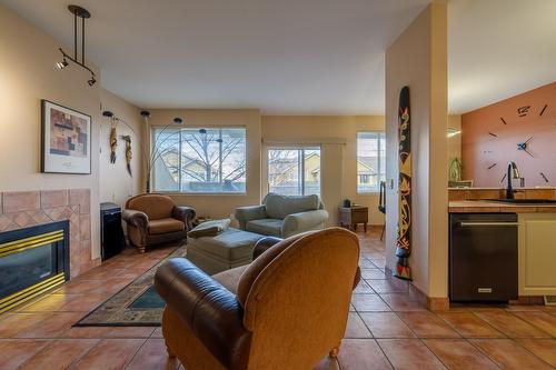 8-2365 Abbeyglen Way, Kamloops, BC - Indoor Photo Showing Living Room With Fireplace