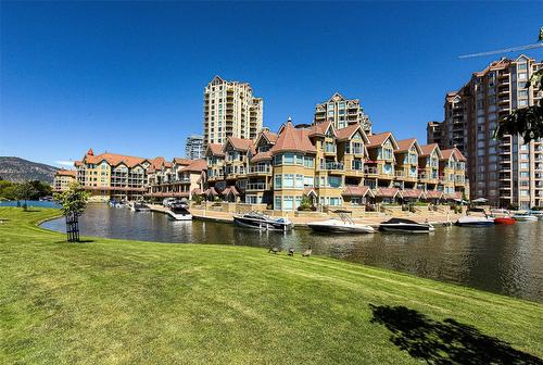 801-1152 Sunset Drive, Kelowna, BC - Outdoor With Body Of Water With Facade