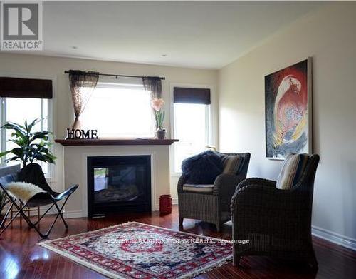 619 Spikemoss Place, Ottawa, ON - Indoor Photo Showing Living Room With Fireplace