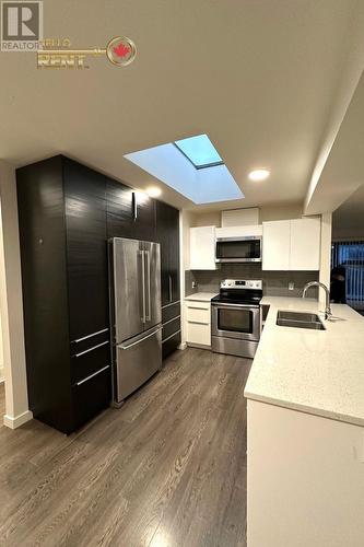 6538 Pinehurst Drive, Vancouver, BC - Indoor Photo Showing Kitchen With Double Sink