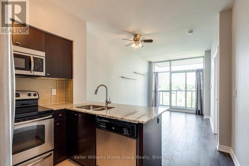 419 - 1940 Ironstone Drive, Burlington (Uptown), ON - Indoor Photo Showing Kitchen With Double Sink