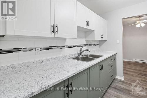 309 - 1100 Millwood Avenue, Brockville, ON - Indoor Photo Showing Kitchen With Double Sink