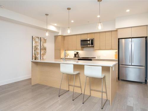 205-10670 Mcdonald Park Rd, North Saanich, BC - Indoor Photo Showing Kitchen With Stainless Steel Kitchen With Upgraded Kitchen