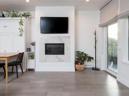 205-10670 Mcdonald Park Rd, North Saanich, BC - Indoor Photo Showing Living Room With Fireplace