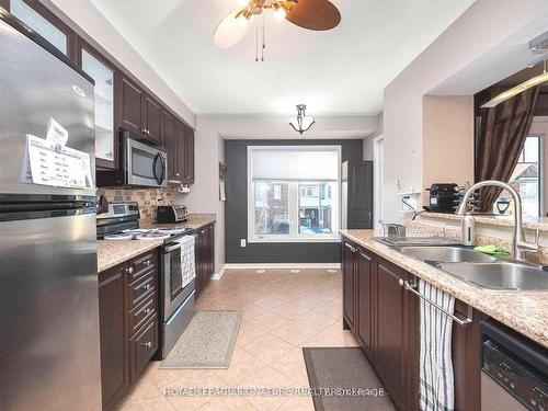 52 Gleave Terr, Milton, ON - Indoor Photo Showing Kitchen With Stainless Steel Kitchen With Double Sink