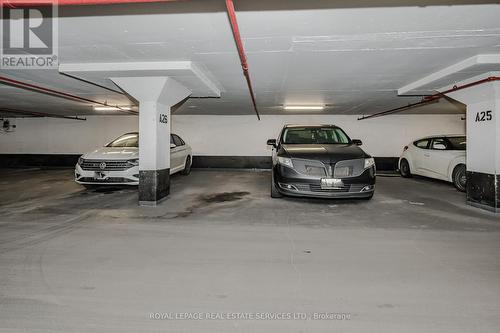 205 - 212 Kerr Street, Oakville, ON - Indoor Photo Showing Garage