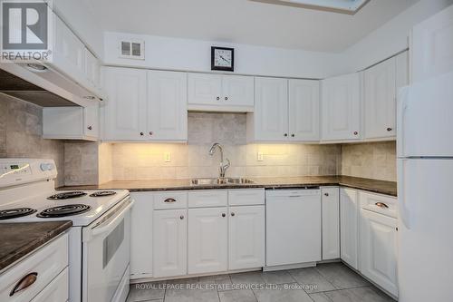 205 - 212 Kerr Street, Oakville, ON - Indoor Photo Showing Kitchen With Double Sink