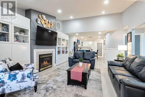 11 - 630 Albert Street, Fort Erie (333 - Lakeshore), ON - Indoor Photo Showing Living Room With Fireplace