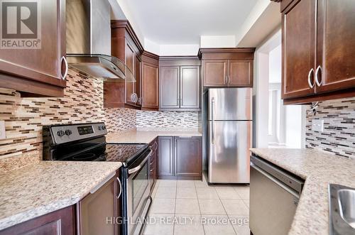 27 Poetry Drive, Vaughan, ON - Indoor Photo Showing Kitchen With Upgraded Kitchen