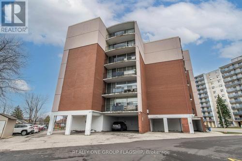 702 - 293 Mohawk Road E, Hamilton, ON - Outdoor With Balcony With Facade