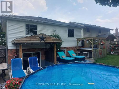 59 Stonehenge Road, London, ON - Outdoor With Above Ground Pool