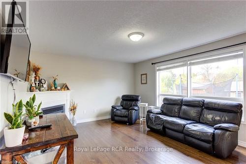 132 Schmidt Drive, Wellington North (Arthur), ON - Indoor Photo Showing Living Room With Fireplace