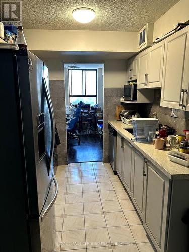 903 - 121 Trudelle Street S, Toronto, ON - Indoor Photo Showing Kitchen With Double Sink