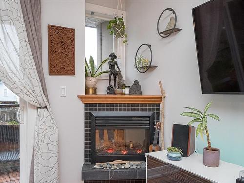 301-76 Gorge Rd West, Saanich, BC - Indoor With Fireplace