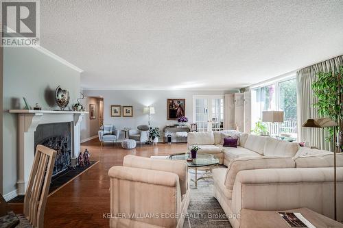 2 - 150 Wilson Street W, Hamilton, ON - Indoor Photo Showing Living Room With Fireplace