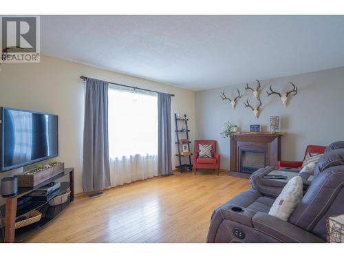 7388 Thompson Drive, Prince George, BC - Indoor Photo Showing Living Room With Fireplace