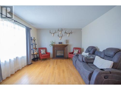 7388 Thompson Drive, Prince George, BC - Indoor Photo Showing Living Room With Fireplace