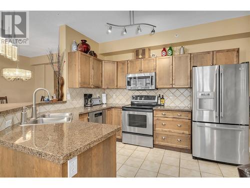 1128 Sunset Drive Unit# 407, Kelowna, BC - Indoor Photo Showing Kitchen With Stainless Steel Kitchen With Double Sink