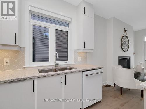 565 Bobolink Ridge, Ottawa, ON - Indoor Photo Showing Kitchen With Double Sink