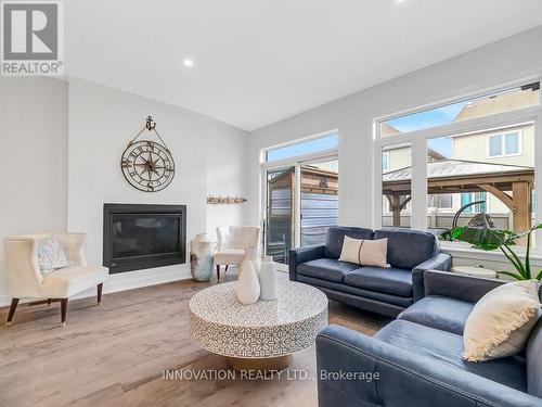 565 Bobolink Ridge, Ottawa, ON - Indoor Photo Showing Living Room With Fireplace