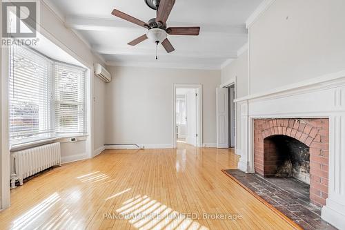 1 - 8 Thirty Third Street, Toronto, ON - Indoor With Fireplace