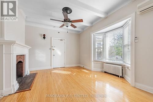 1 - 8 Thirty Third Street, Toronto, ON - Indoor Photo Showing Other Room With Fireplace