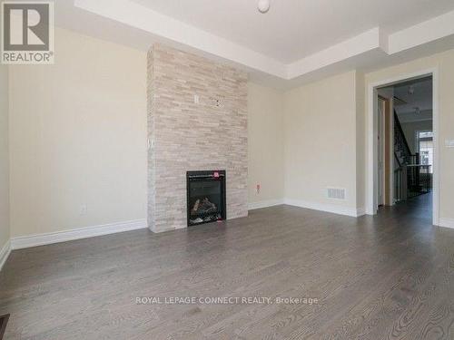 10 Seagrave Lane, Ajax, ON - Indoor Photo Showing Living Room With Fireplace